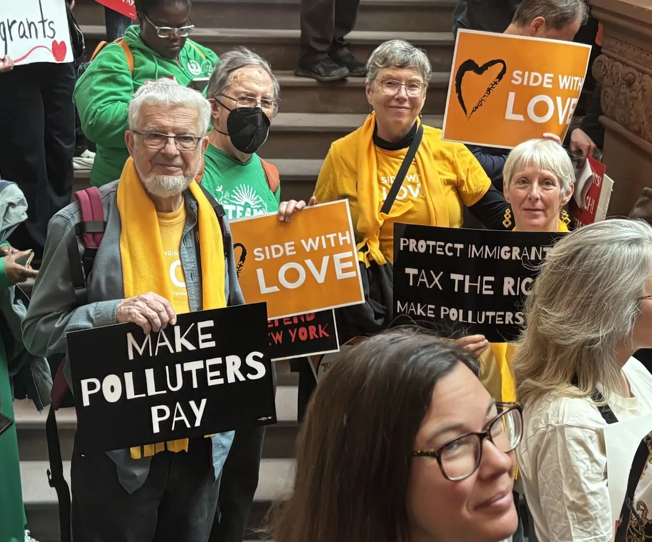 Icon illustrating a rally to defend New York climate policy