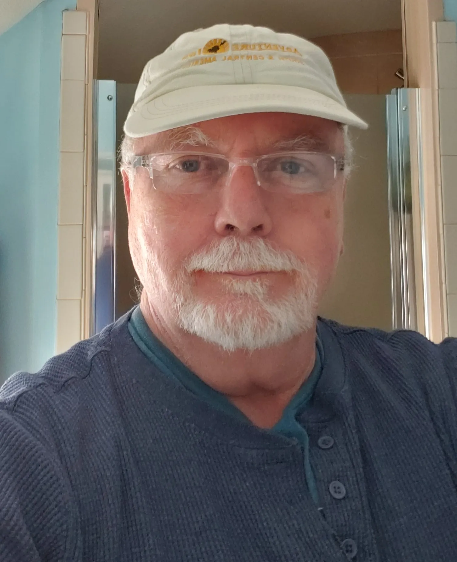 Frank Traynor smiling in a self-portrait