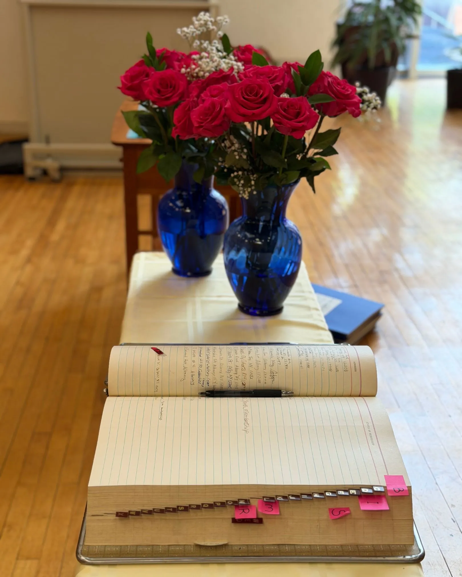 A membership book open on display
