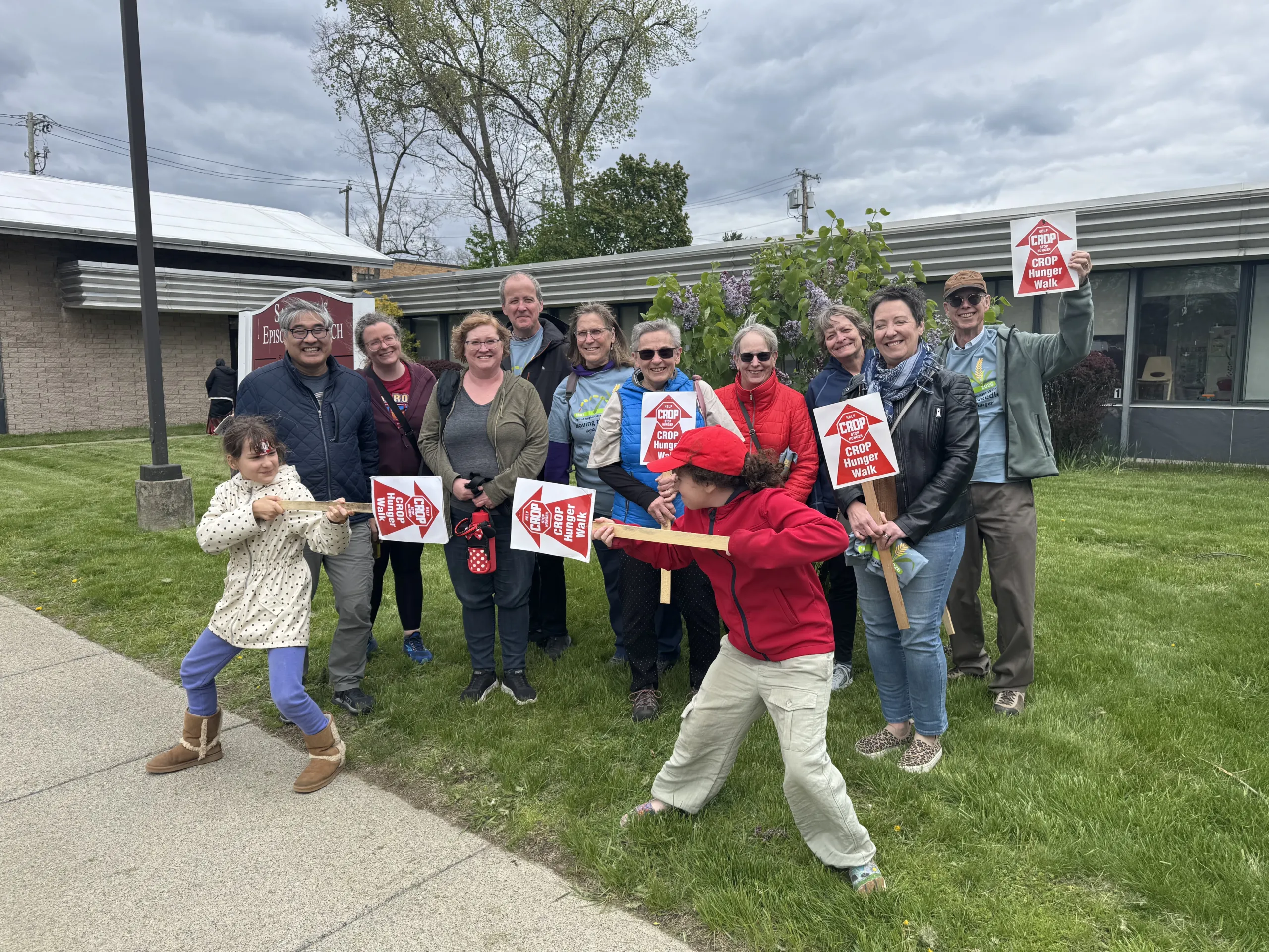 CROP Walk Team UU 2026 Photo showing the 10 adults and 2 kids who made up Albany UU's 2026 CROP Walk Team.